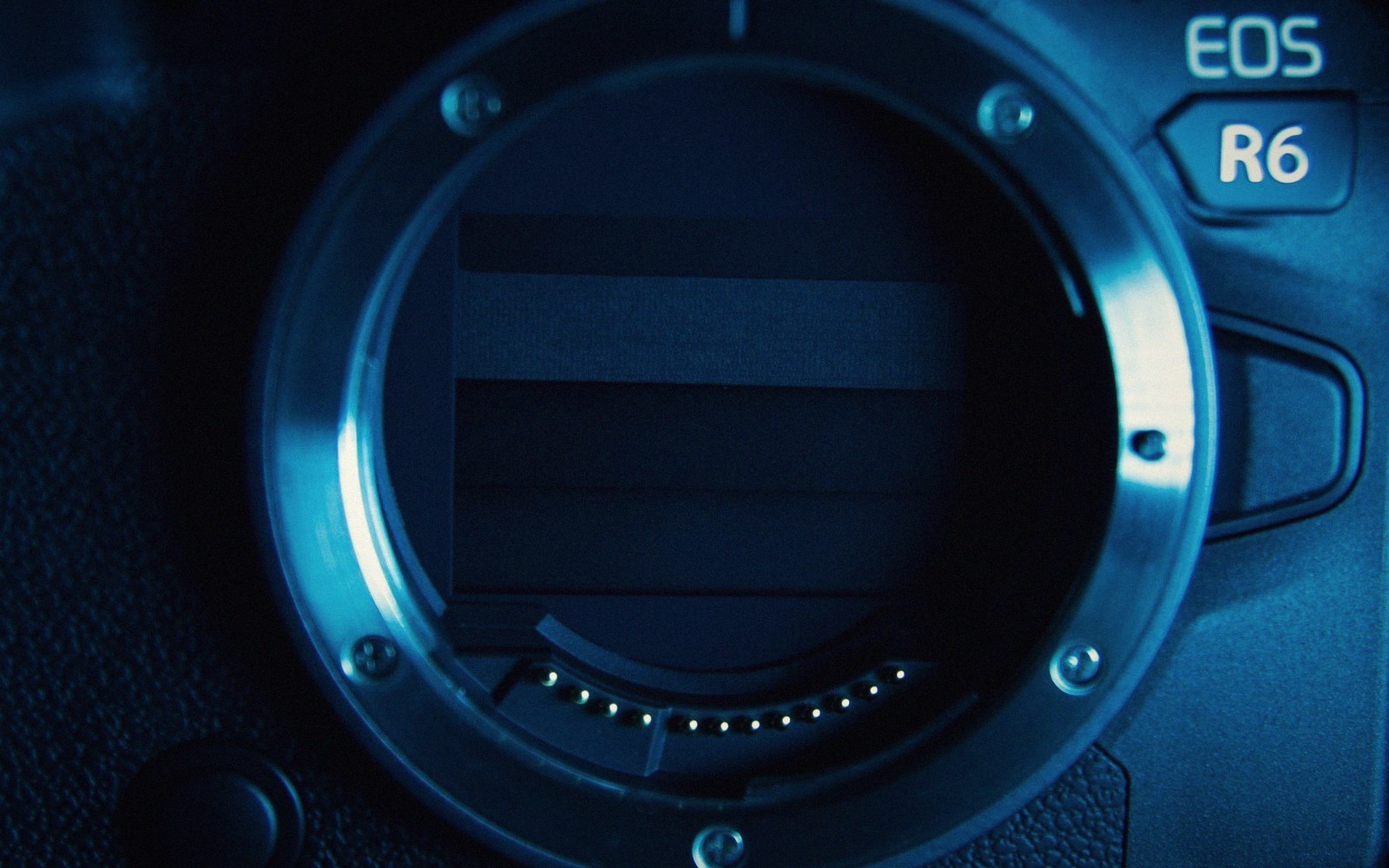 Close-up of the lens mount and image sensor inside a Canon EOS R6 camera